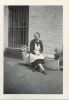 Mary Sculco Campanella Buono, seated on planter box